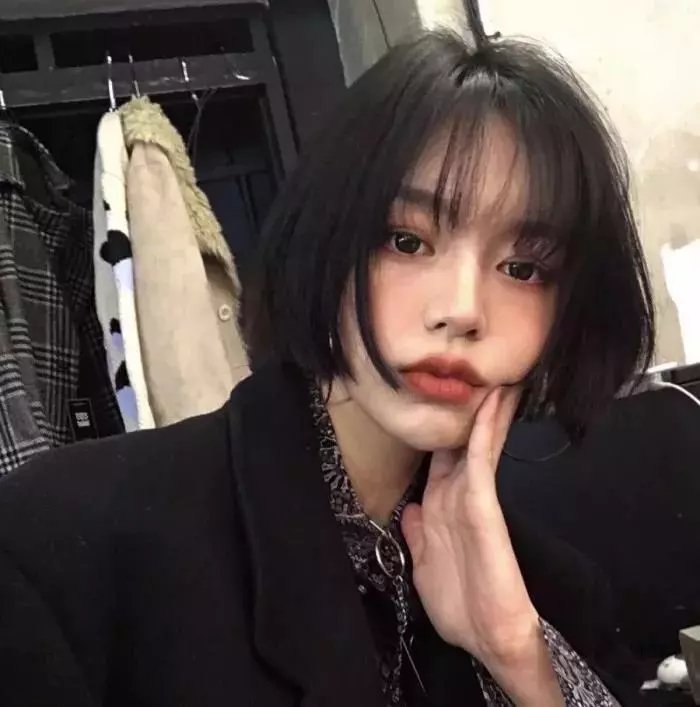 橘衫男子的画像